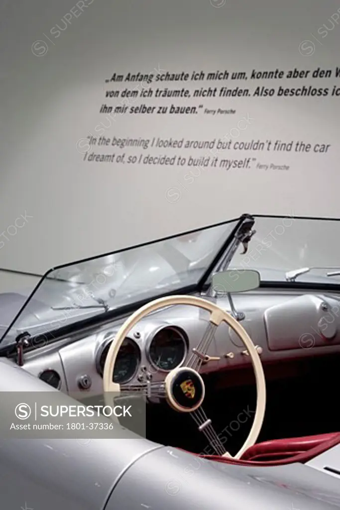 Porsche Museum, Stuttgart, Germany, Delugan Meissl Associated Architects, Porsche museum: detail of a 356 convertible with quotation on the wall..