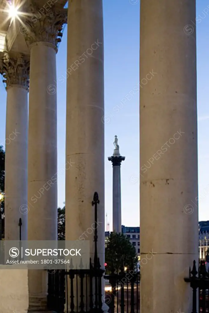 St Martins-in-the-fields, London, United Kingdom, Eric Parry, Twilight view through the potico entrance to nelsons column.