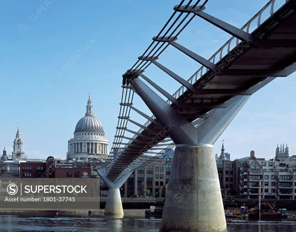 Millennium Bridge, London, United Kingdom, Foster and Partners Ove Arup and Partners and Sir Anthony Caro, Millennium bridge bridge with st paul's from below on beach.