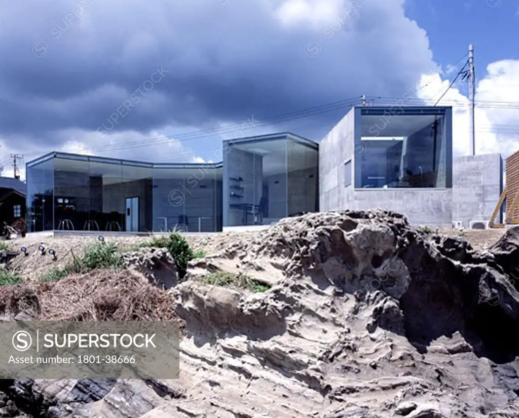 The O House, Japan, Sou Fujimoto Architects, The O house exterior low level view from volcanic rock formation.