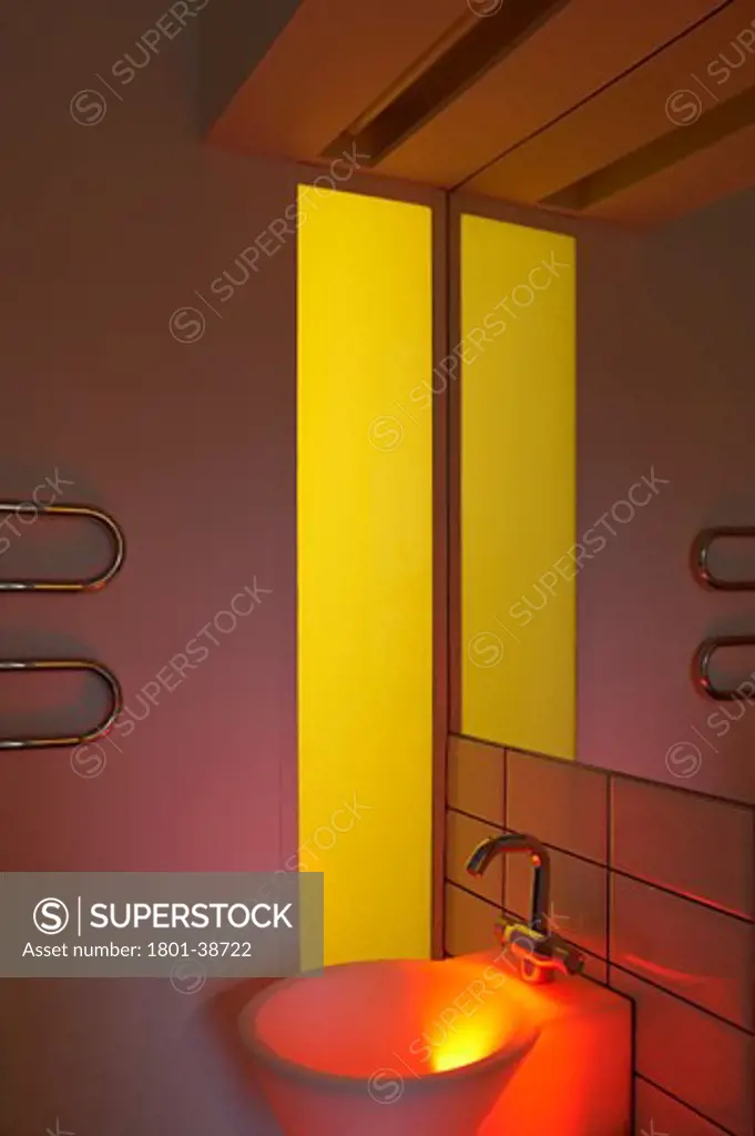 Private House, London, United Kingdom, Glas Architects, Private house bathroom detail with yellow and red lighting.