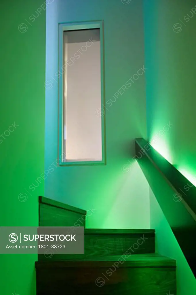 Private House, London, United Kingdom, Glas Architects, Private house view of the staircase with green lighting.