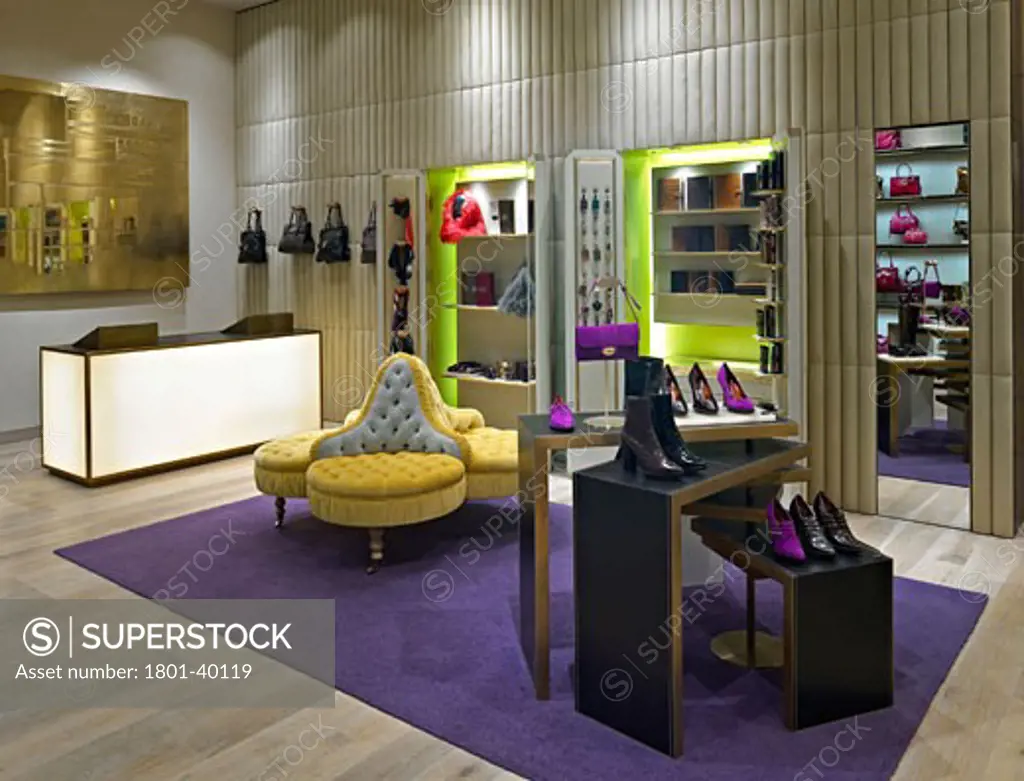 Mulberry Westfield, London, United Kingdom, Four IV Design, Mulberry westfield - four IV design interior from front of store looking down right-hand wall displays with free standing display and till point in background.