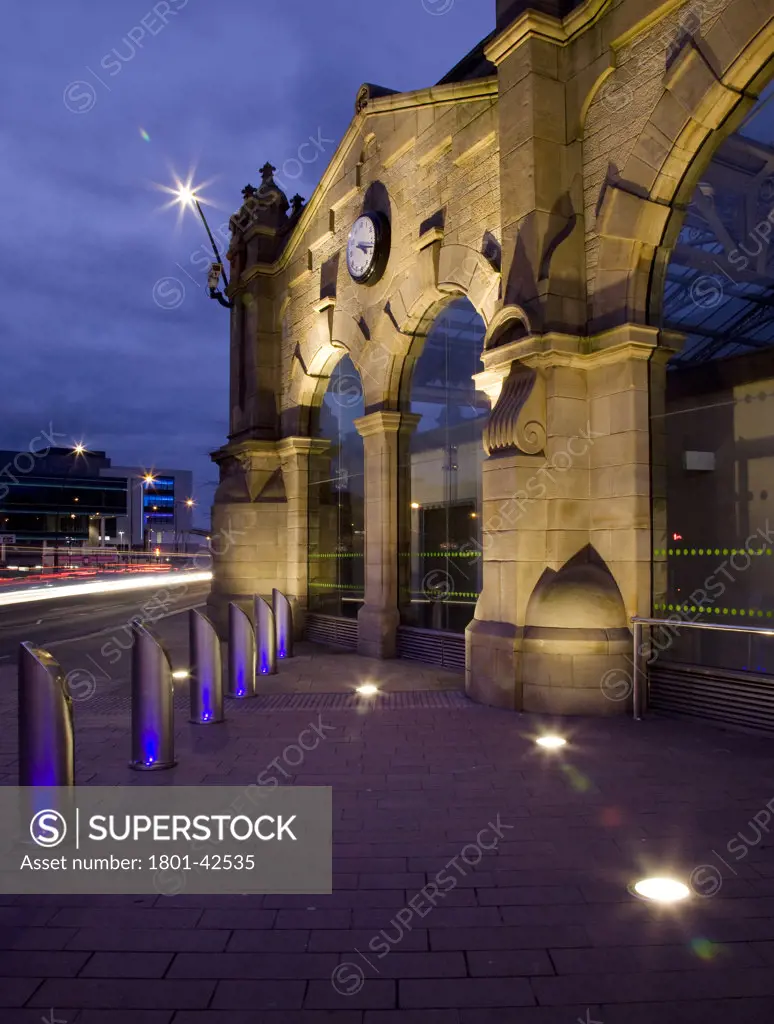 Sheffield Station, Sheffield, United Kingdom, Owen Ellis Architects, Exterior evening view of sheffield station. Focusing on the new glass windows inserted in to the original stone structure..