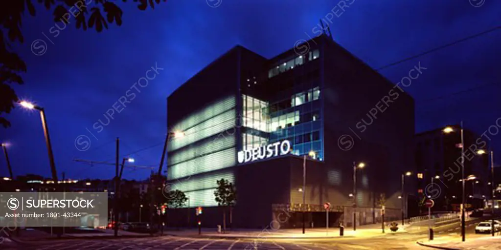 Deusto University Library-Crai, Bilbao, Spain, Rafael Moneo, Deusto-crai inside lighting begins to show through at dusk.