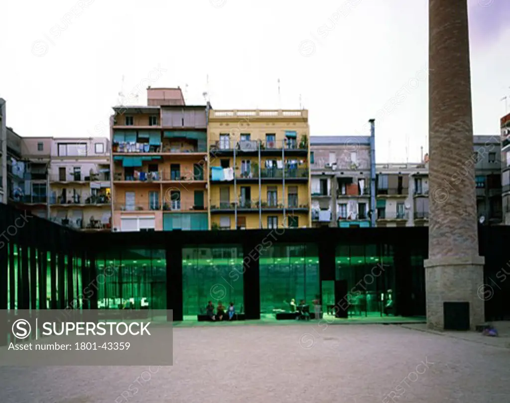 Saint Antoni Library Old Peoples Home and Plaza, Barcelona, Spain, Rcr Arquitectes, Saint antoni library old peoples home and plaza the library as seen in the evening.