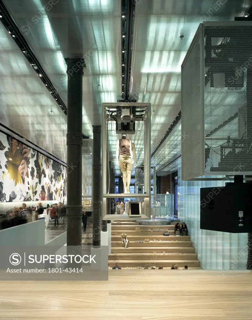 Prada Fashion Store, New York, United States, Rem Koolhaas - Office for Metropolitan Architecture, Prada fashion store portrait view from behind slope towards steps.