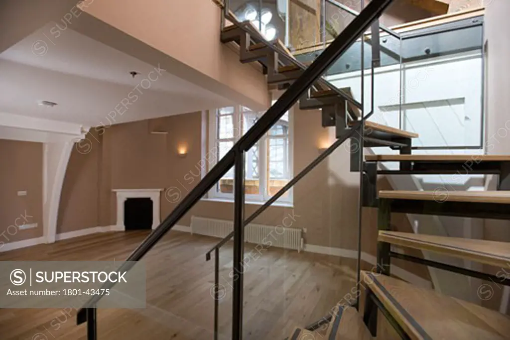 St. Pancras Chambers, London, United Kingdom, Rhwl Architects, St. Pancras chambers apartment interior with original roof beams and new staircase in duplex aegrant smith 2009.