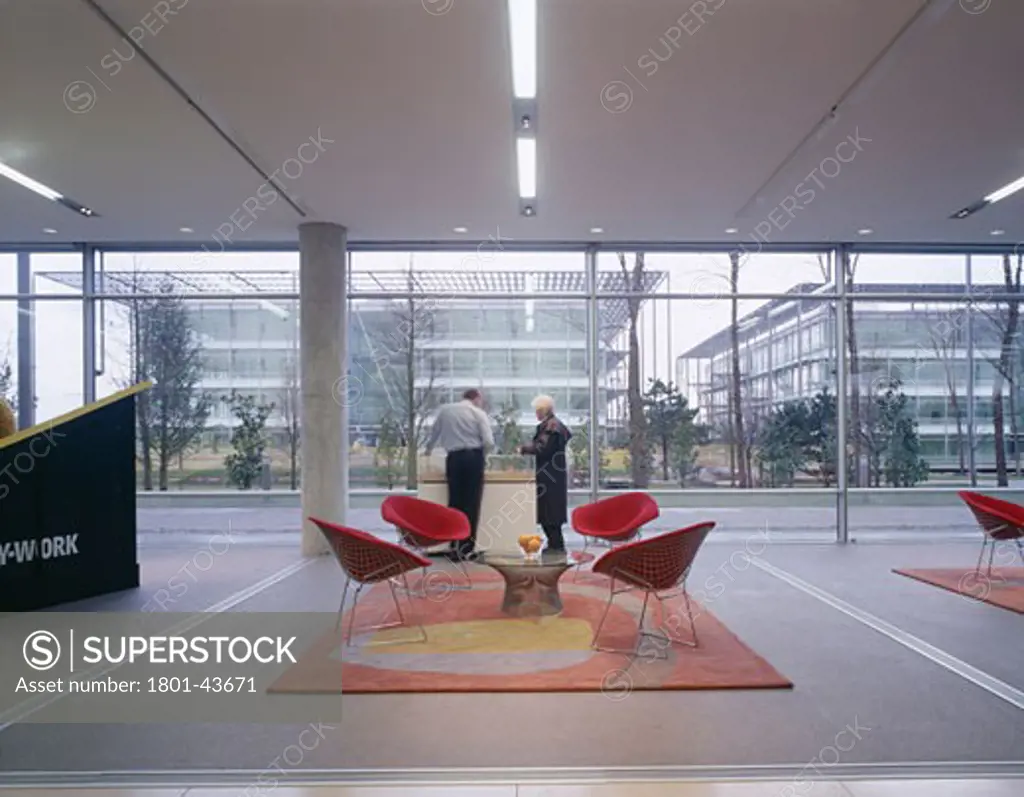 Chiswick Park, London, United Kingdom, Richard Rogers Partnership, Chiswick park interior- reception area with people.