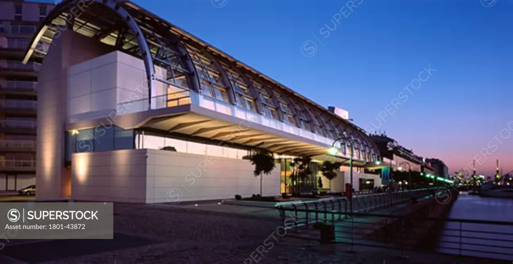 Coleccion Fortabat, Buenos Aires, Argentina, Rafael Vinoly Architects, Collection fortabat lateral exterior dusk view where the inside of gallery can be seen as roof is fully opened.
