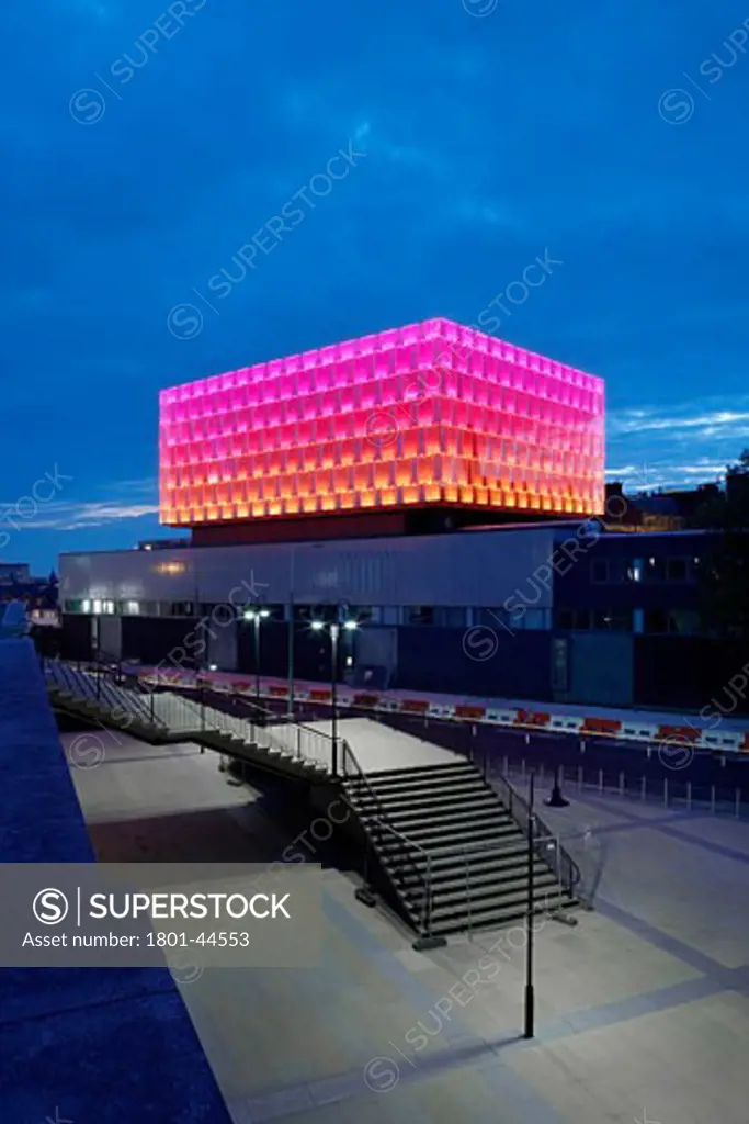 University of Liverpool Faculty of Engineering, Liverpool, United Kingdom, Sheppard Robson, University of liverpool faculty of engineering a general view of the building lit up by night in bright neon light.