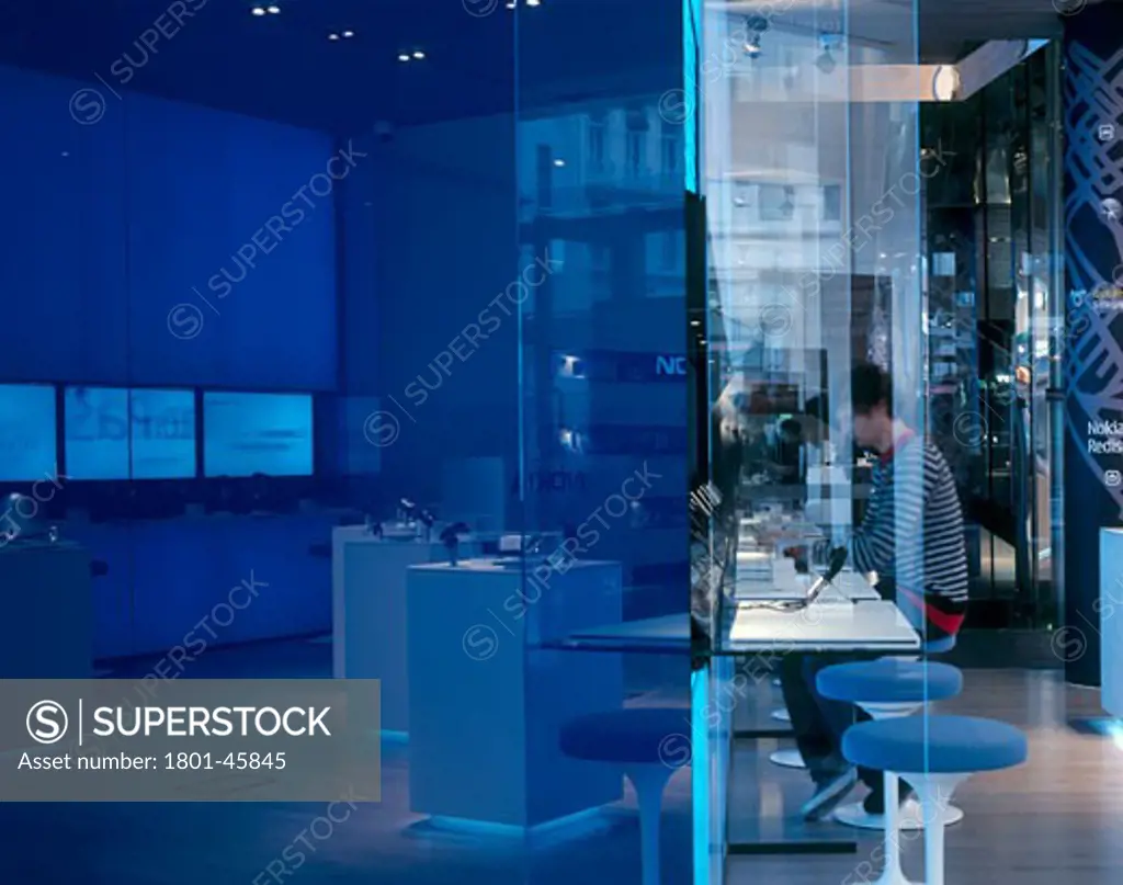 Nokia London Flag Ship Store, London, United Kingdom, Architect Unknown, Nokia london flag ship store reflections in blue screen to sales floor.