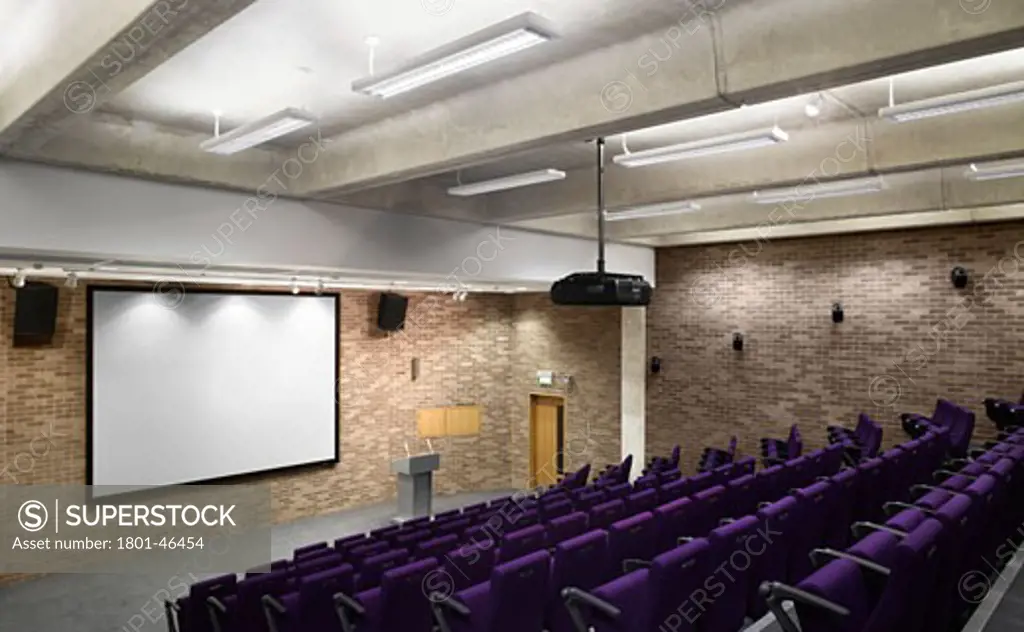 Basement lecture theater gillespie building clare college cambridge by van heyningen and haward architects (vhh).