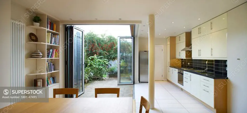 Private House, London, United Kingdom, Archicraft, PRIVATE HOUSE ARCHICRAFT ROB MATHISON SOUTH WOODFORD LONDON UK 2009. PANORAMIC INTERIOR SHOT SHOWING THE FEATURE GLASS DOOR AND OPEN PLAN LIVING