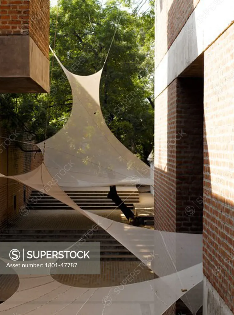 Cept University (Centre for Environmental Planning and Technology), Ahmedabad, India, Balkrishna Doshi, CEPT UNIVERSITY ARCHITECTURE SCHOOL-VIEW ALONG WALKWAY WITH STUDENT PROJECT