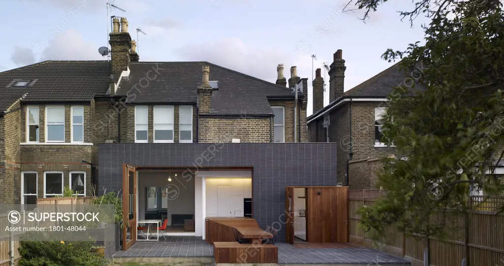 Tray House, Wanstead, United Kingdom, Hayhurst & Co, Tray House award winning new london architecture - best use of brick dont move improve Hayhurst and Co 26 Fournier Street London E1 6QE west elevation from garden inc house