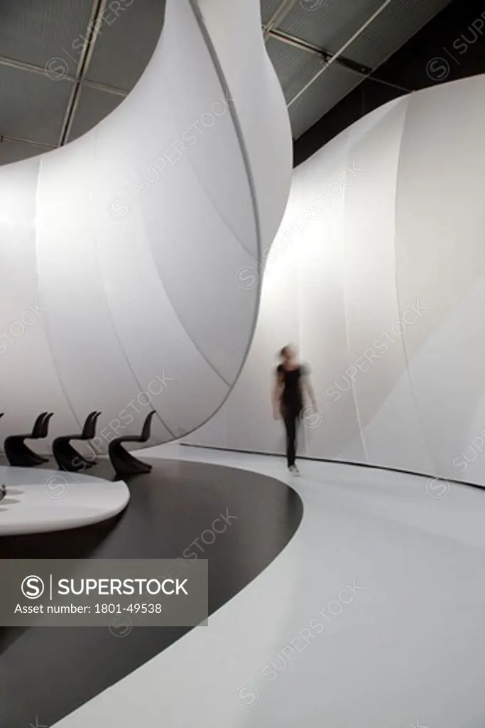 Chamber Music Hall, Manchester, United Kingdom, Zaha Hadid Architects, figure walking in to the structure