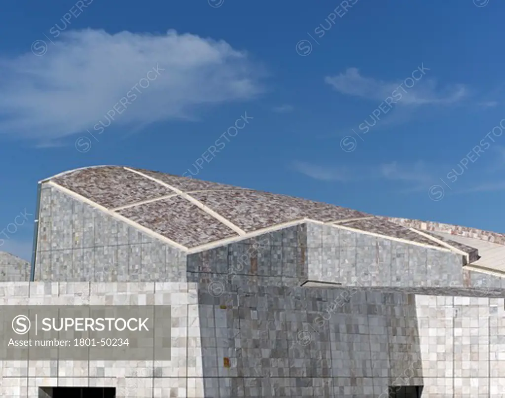 Cidade Da Cultura, Santiago De Compostela, Spain, Peter Eisenman Architects, CITY OF CULTURE GALICIA SPAIN PETER EISENMAN ARCHITECTS DETAIL SHOWING STONE SAMPLES OF ARCHIVE IN THE FOREGROUND AND LIBRARY AT THE BACKGROUND