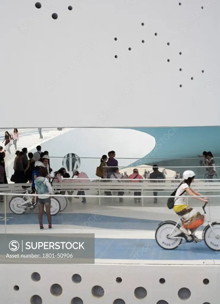 Shanghai Expo 2010 Danish Pavilion, Shanghai, China, Big / Bjarke Ingels Group, SHANGHAI EXPO 2010 DANISH PAVILION BIG / BJARKE INGELS GROUP SHANGHAI 2010 DETAILED VIEW OF PERFORATED SPIRAL-FORM RAMP WITH CYCLISTS AND VISITORS