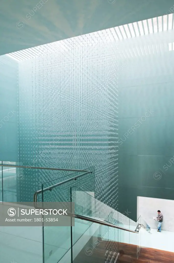 Memory And Tolerance Museum In Mexico City By Arditti Arquitectos Interior View Of Exhibition Display With Man At Bottom Of Floating Staircase