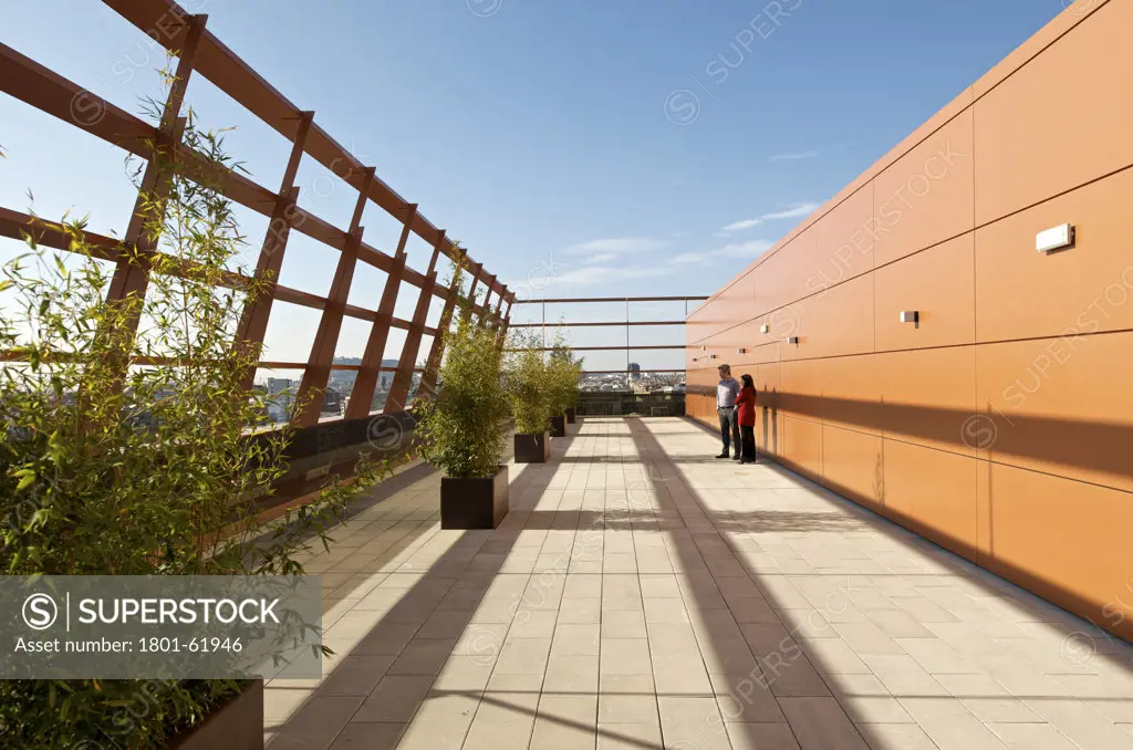 Cmt- Communications Market Commission Hq Ib Barcelona By Batlle I Roig. Roof Terrace With Two People Standing
