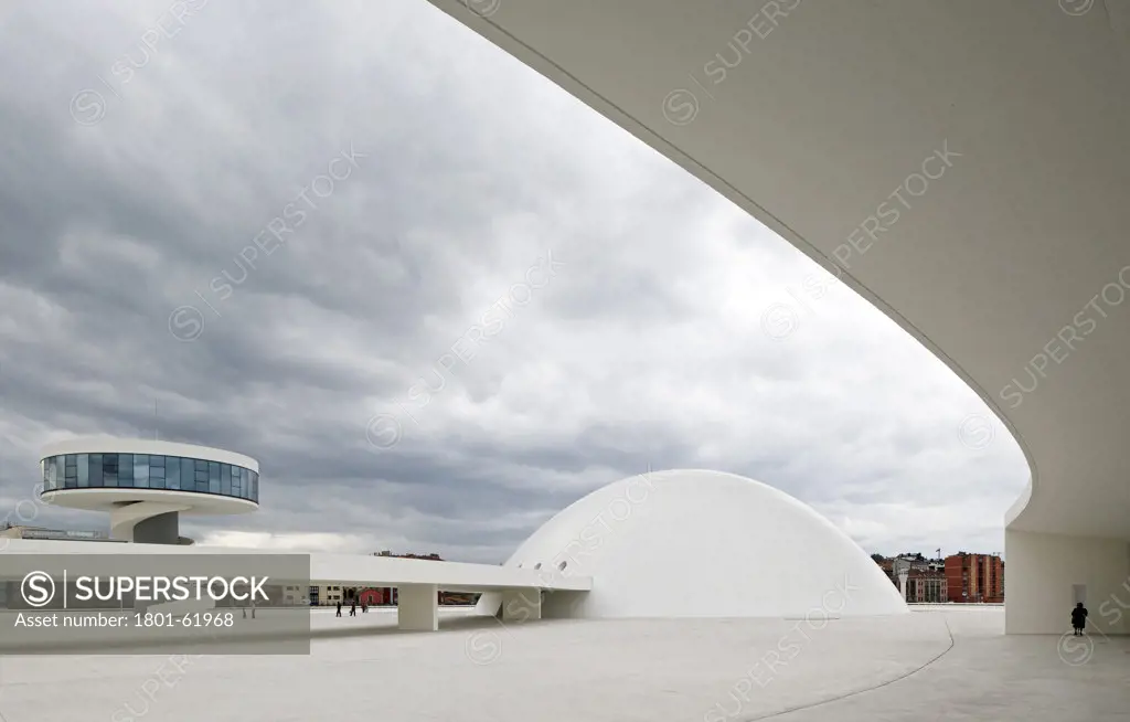Niemeyer Center In Aviles  Spain  By Oscar Niemeyer. General Exterior View Of Public Plaza With Dome And Tower  On A Over Cast Day