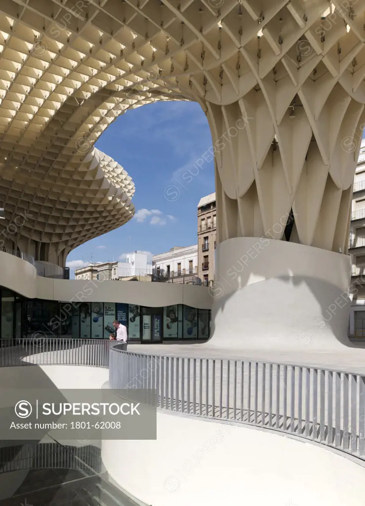 Metropol Parasol By J Mayer H Architects In Sevilla Spain. A Man And A Boy Looking Down Onto The Archeological Museum