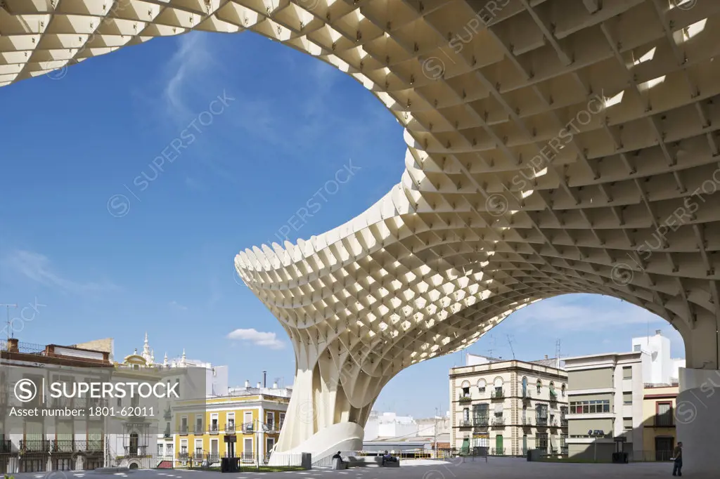 Metropol Parasol By J Mayer H Architects In Sevilla Spain. View Of Roof And Elevated Plaza With Vernacular Building In The Background
