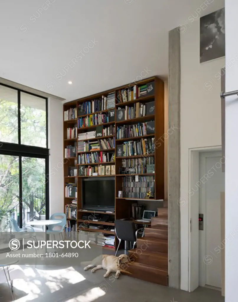Javier Sanchez Arquitectura Apartment House In Colonia Condesa Mexico City   Detail Showing Lift Entrance And Book Shelves