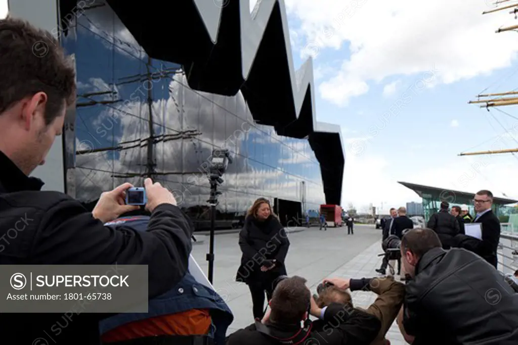 Riverside Museum Of Transport Designed By Zaha Hadid Architects.  Zaha Hadid With The Press, Riverside Facade With The Tall Ship