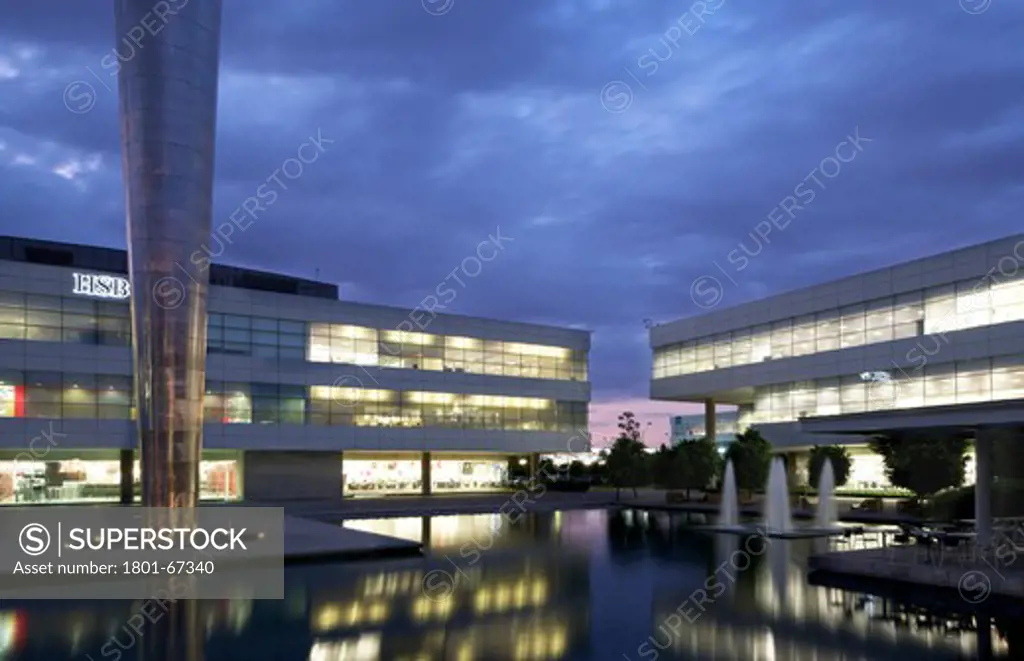 Tecnoparque In Mexico City By Mario Schejtnan And Grupo Urbano. Evening View Of Artificial Lake With Mixed Light