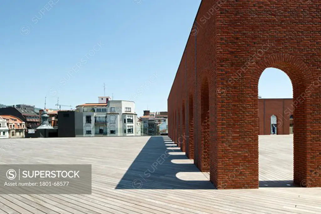 Alhóndiga Bilbao By Philippe Starck View Of Roof Showing Solarium And Shadows On Wodden Deck