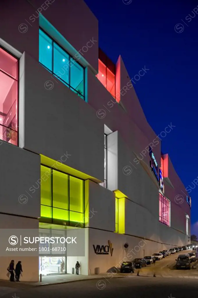 Shopping Mall Centro Comercial Promontorio Architects Guarda Portugal 2009 Dusk View Of Illuminated Exterior Facade