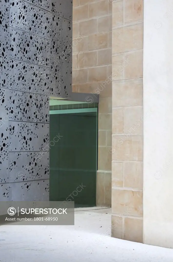 Detail Of The Original Wall And Perforated Aluminium Panels. Extension To San Telmo Museum, San Sebastian, Spain. Architects Nieto Sobejano.