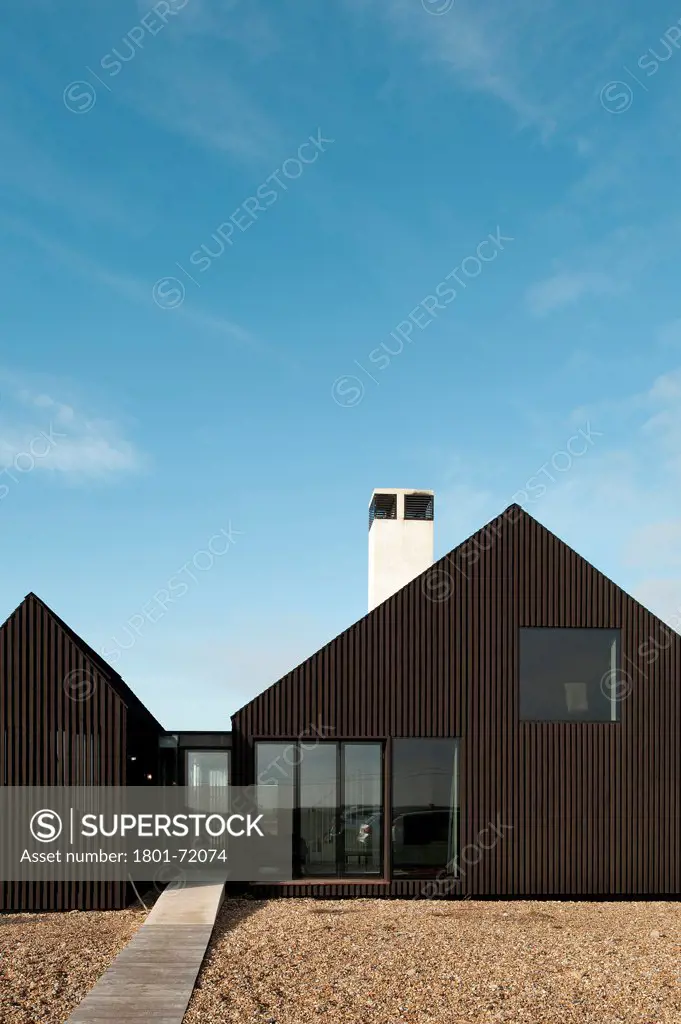 Shingle House, Dungeness, United Kingdom. Architect Nord Architecture, 2011. Front elevation.