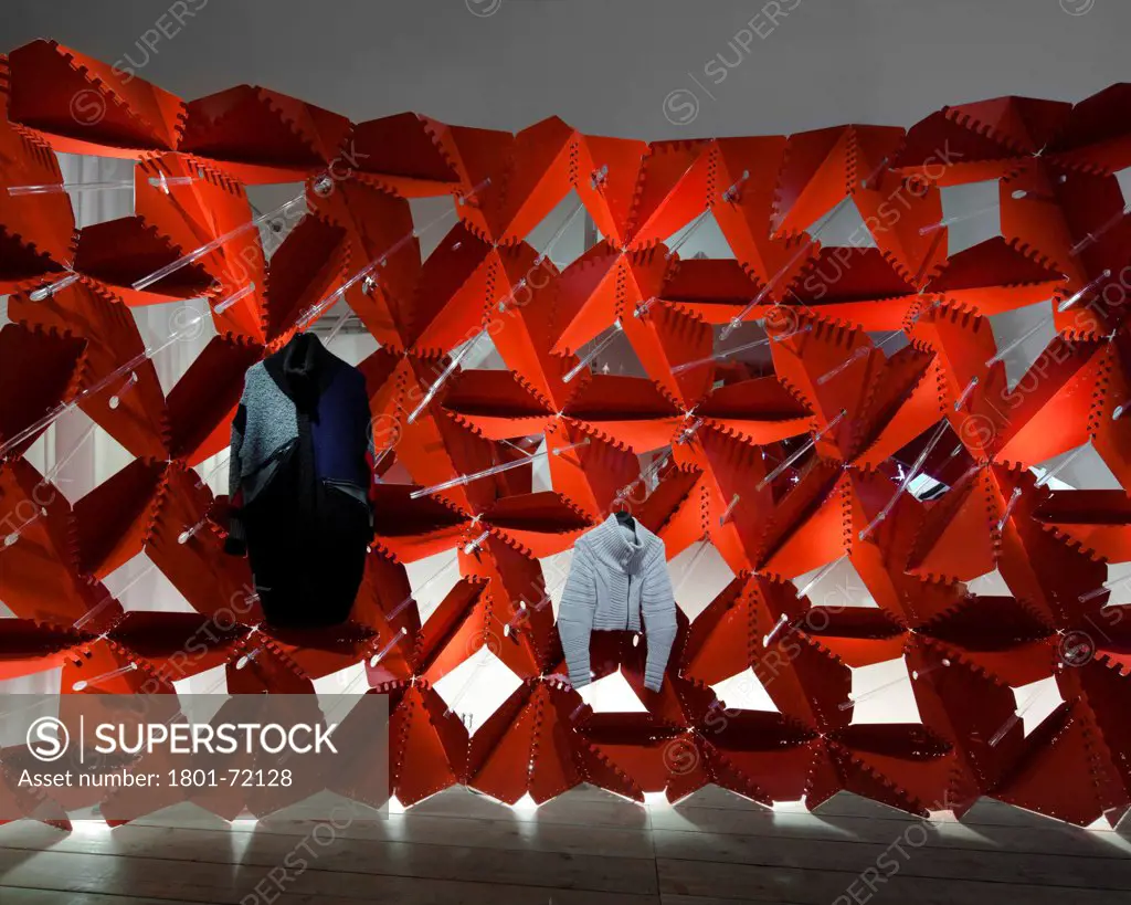 Boffo Building Fashion, New York, United States. Architect Easton Combs Architects, 2011. Digital fabrication, computational scripting, modular wall system, clothing display system. Powder coat red.