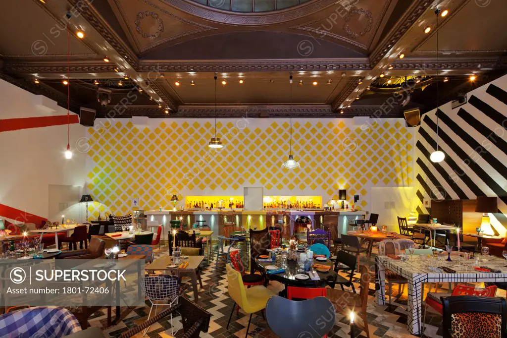 Sketch, London, United Kingdom. Architect Martin Creed, 2012. Colourful restaurant designed by artist Martin Creed. An eclectic mix of mis-matched chairs, tables, glassware, crockery and cutlery.