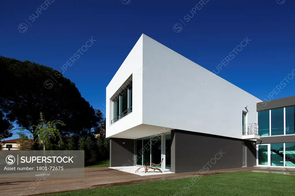 Godiva House, Estoril, Portugal. Architect Empty Space Arquitectos, 2012. General outside view of outside garden.
