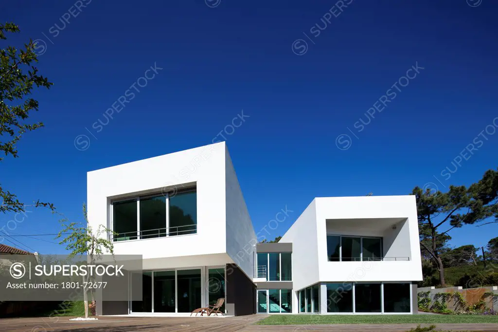 Godiva House, Estoril, Portugal. Architect Empty Space Arquitectos, 2012. General outside view from the garden.