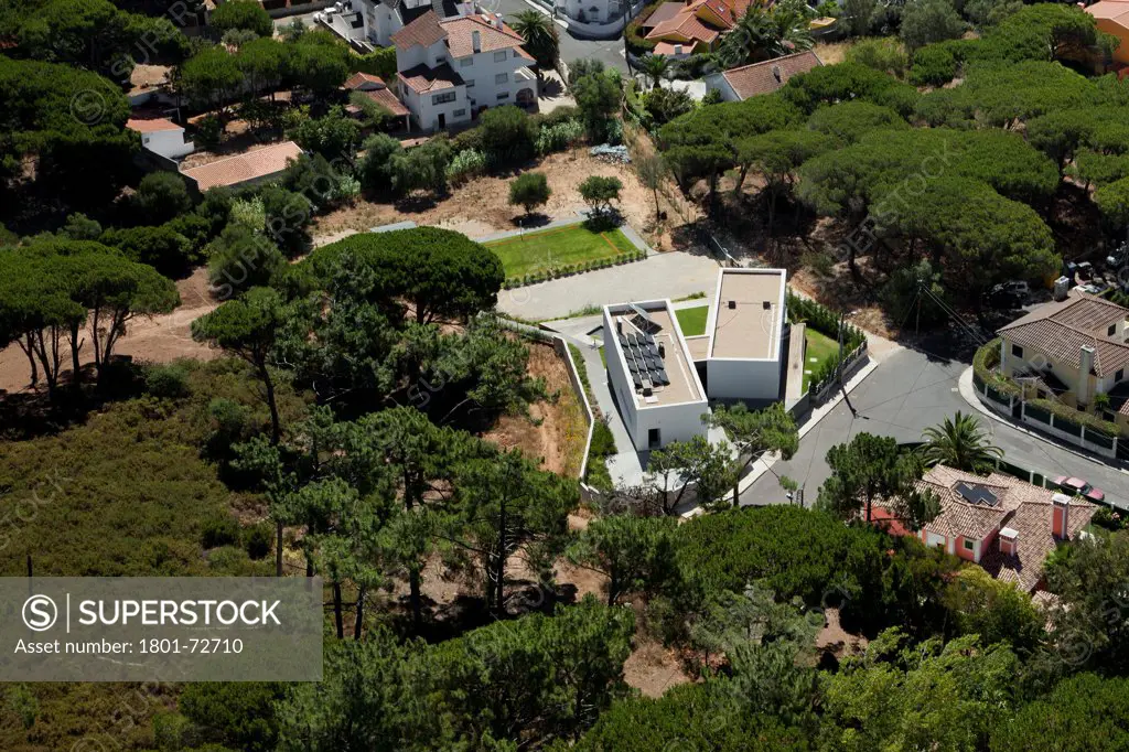 Godiva House, Estoril, Portugal. Architect Empty Space Arquitectos, 2012. Aerial view from North.