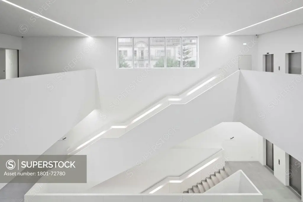 Platform for Arts and Creativity, Guimaraes, Portugal. Architect Pitágoras Arquitectos, 2012. General view of stair area from first floor.
