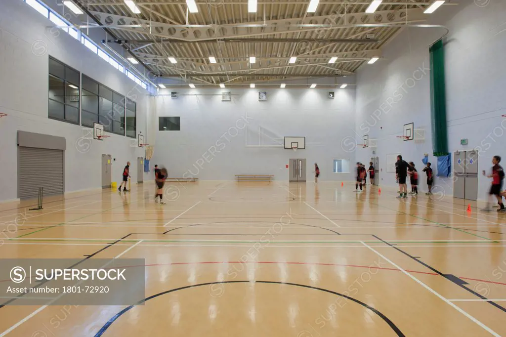 Trinity School Sports Hall, Newbury, United Kingdom. Architect ADP Architects Ltd, 2012. Interior view of main sports hall.