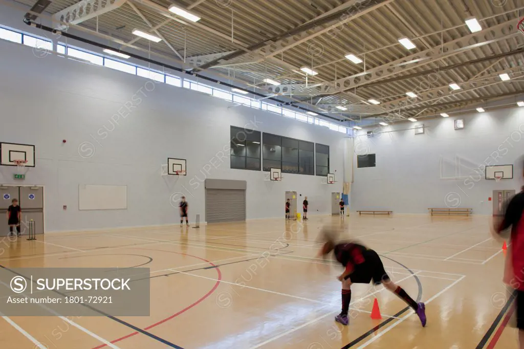 Trinity School Sports Hall, Newbury, United Kingdom. Architect ADP Architects Ltd, 2012. Interior view of main sports hall.