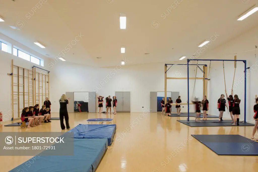 Trinity School Sports Hall, Newbury, United Kingdom. Architect ADP Architects Ltd, 2012. Interior view of gym.