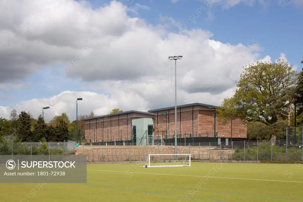 Trinity School Sports Hall, Newbury, United Kingdom. Architect ADP Architects Ltd, 2012. Distant view of sports hall.
