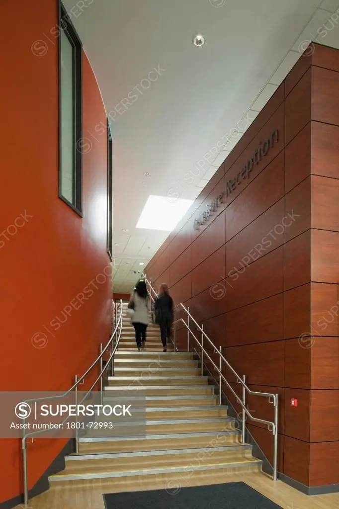 Houghton Primary Care Centre, Houghton Le Spring, United Kingdom. Architect P+HS Architects, 2011. Interior view of stairs to first floor.