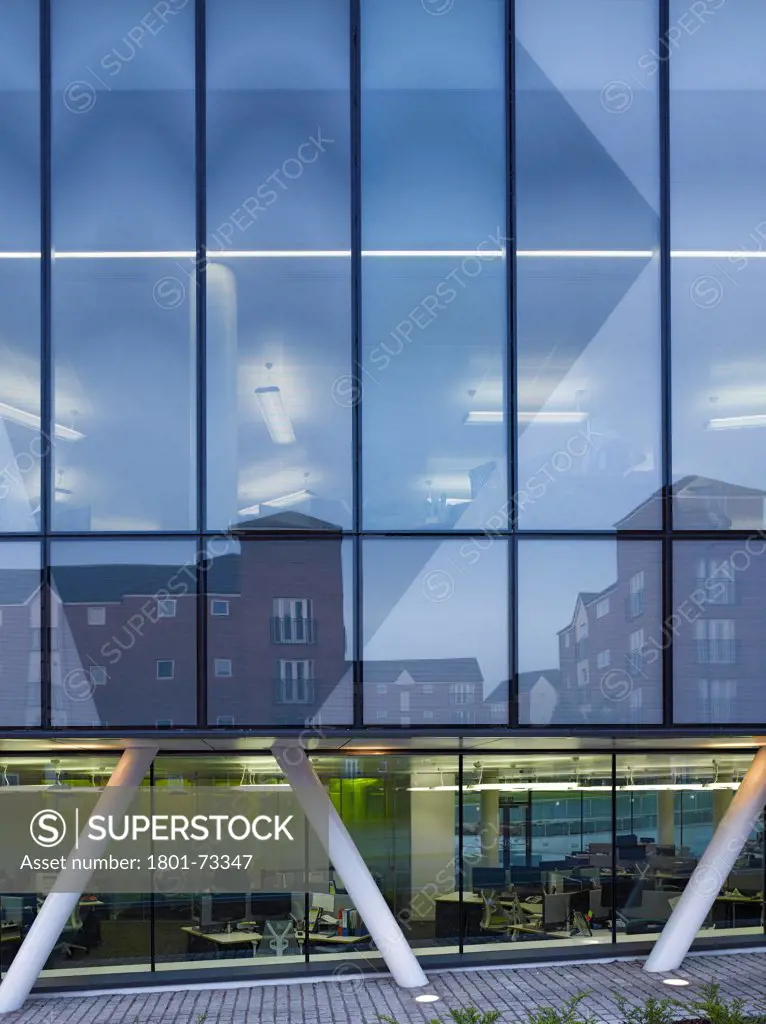 Office Building for Walsall Housing Group, Office, Europe, United Kingdom, West Midlands, 2012, Bisset Adams. Detail of ground and first floor facade glazing with glass reflection.
