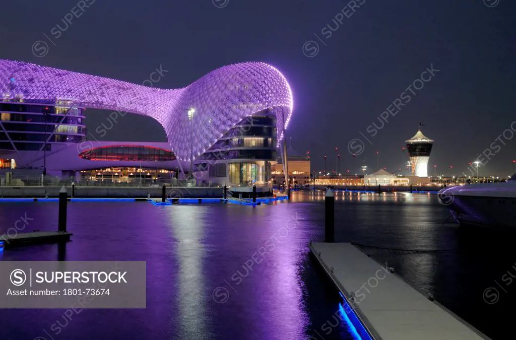 The Yas Hotel, Asymptote, Hani Rashid and Lise Anne Couture, Abu Dhabi, United Arab Emirates 2010 outside view by night with the marina
