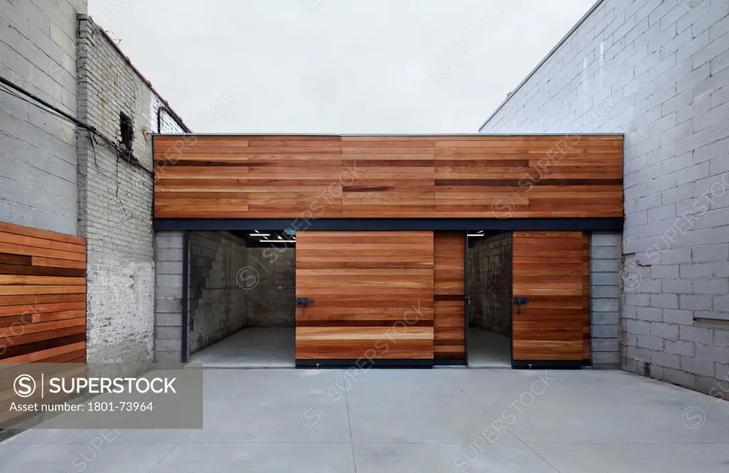 Bushwick Motorcycle Garage and Garden, Brooklyn, United States. Architect: Dameron Architecture, 2012. Motorcycle collectors garage in up and coming artist neighborhood in Brooklyn.