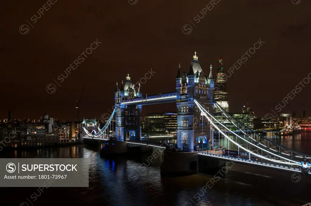 Tower Bridge Re-Lighting, London, United Kingdom. Architect: Horace Jones, 2012. View from the Guoman Hotel with bridge in closed position.